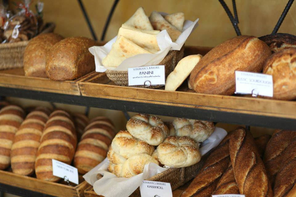 Shelves of Vinman's fresh breads and rolls